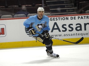 Pascal Dupuis of the Pittsburgh Penguins will be out for six months because of a blood clot in his lung. (JOCELYN MALETTE/QMI Agency files)