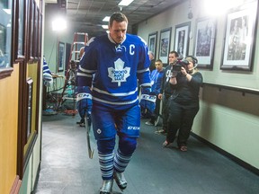 Toronto Maple Leafs captain Dion Phaneuf  walks to the ice for the pregame skate before  the Leafs play host to the Detroit Red Wings at the  Air Canada Centre in Toronto, Ont. on Nov. 22, 2014. (ERNEST DOROSZUK/Toronto Sun)