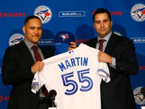 Blue Jays GM Alex Anthopoulos (R) with new Jay Russell Martin at a press conference at the Rogers Centre in Toronto on Thursday November 20, 2014. (Craig Robertson/Toronto Sun)