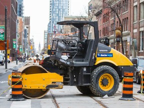 A stationary road roller on Adelaide St. W. in downtown Toronto on Tuesday, November 4, 2014. (Ernest Doroszuk/Toronto Sun)
