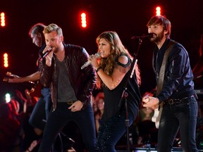 Lady Antebellum performs "Bartender" during the 48th Country Music Association Awards in Nashville, Tenn., on November 5, 2014. (REUTERS/Harrison McClary)
