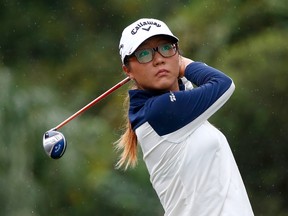 Lydia Ko of New Zealand plays a shot on the sixth hole during the third round of the CME Group Tour Championship at Tiburon Golf Club on November 22, 2014 in Naples, Florida. (Sam Greenwood/Getty Images/AFP)
