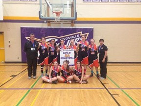 The Lasalle Lancers senior girls basketball team celebrates with their OFSAA silver banner Saturday.