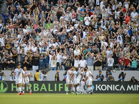 Los Angeles Galaxy midfielder Marcelo Sarvas (8) celebrates with his team after a goal against the Seattle Sounders during the second half of the Western Conference Championship at StubHub Center on Nov 23, 2014 in Carson, CA, USA. (Kelvin Kuo/USA TODAY Sports)