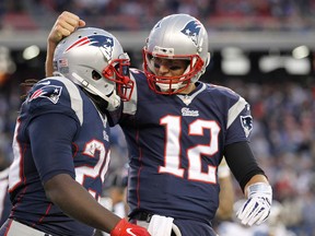 Patriots’ Tom Brady celebrates a touchdown with LeGarrette Blount, who re-joined the team earlier this week. (USA TODAY SPORTS)