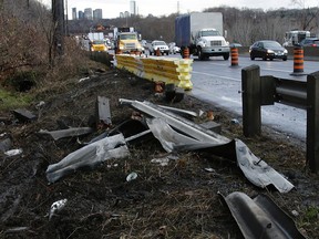 Police say the driver of a car lost control, hit and damaged this guardrail before going into a ditch. (CRAIG ROBERTSON/Toronto Sun)