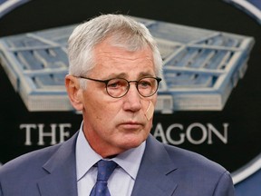 U.S. Secretary of Defense Chuck Hagel speaks at a news briefing to announce reforms to the nuclear enterprise at the Pentagon in Washington, in a November 14, 2014 file photo. Hagel has resigned, a U.S. defense official said on Monday, adding that President Barack Obama had accepted his resignation. Hagel will remain in the Pentagon's top post until a successor is named, the official said. REUTERS/Yuri Gripas/files