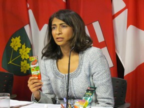 Ontario Associate Health Minister Dipika Damerla announces the province will ban the sale of e-cigarettes to youth and prohibit the product's use wherever smoking is not allowed. Damerla's bill, introduced Monday, Nov. 24 2014, would also ban the sale of flavoured tobacco, including menthol cigarettes. (ANTONELLA ARTUSO/Toronto Sun)