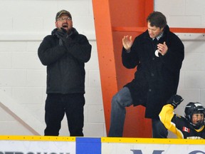 Coaching staff Scott Wood (left) and Andrew Medhurst celebrate a goal from the Mitchell Novice Local League 2 team during action from the Elma Logan tournament last Friday. The Meteors defeated Milverton 5-1 in the final. ANDY BADER/MITCHELL ADVOCATE