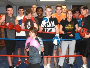 Boxers at the River City Boxing Club. From left to right: Dylan Taylor, Brandon Cavanaugh, Justin Foslett, Eric Walker, Saul Elzy, Matt Smythe, Blake Loxton, Adam Nicolaisen, Sereena Nahmabin, Luis Hernandez, Coach Lawrence Lalonde. Front: Jaxon Nisbet. 
CARL HNATYSHYN/SARNIA THIS WEEK/QMI AGENCY