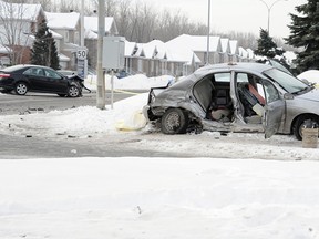Scene of a collision between a police cruiser and a car in Longueuil, Quebec, February 13, 2014. A five-year-old boy was killed in in the accident. (ROBERT COTE/QMI AGENCY)