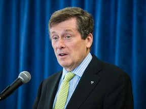 Mayor-elect John Tory addresses the media at the Ontario Investment and Trade Centre in downtown Toronto on Monday, November 24, 2014. (Ernest Doroszuk/Toronto Sun)