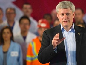 Prime Minister Stephen Harper announces new infrastructure investments across Canada at The Collider Centre  in London, Ontario,  Monday, November 24, 2014.  DEREK RUTTAN/QMI AGENCY