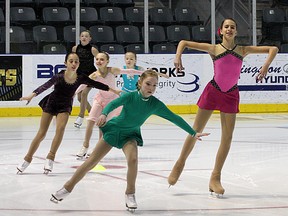 Skaters go through a tryout at the Rogers K-Rock Centre Monday to become flower retrievers at the Canadian Figure Skating Championships in January in Kingston. (IAN MACALPINE/THE WHIG-STANDARD)