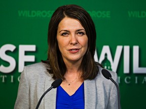 Wildrose leader Danielle Smith gives a statement regarding two Wildrose MLAs who crossed the floor to the Progressive Conservative Party at the Legislature Annex in Edmonton, Alta., on Monday, Nov. 24, 2014. Codie McLachlan/Edmonton Sun