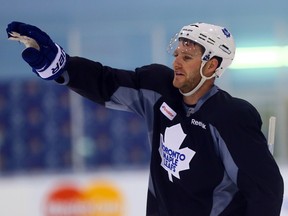 Cody Franson jokes aroun during Leafs practice at the MasterCard Centre in Toronto on Sept. 26, 2014. (DAVE ABEL/Toronto Sun)