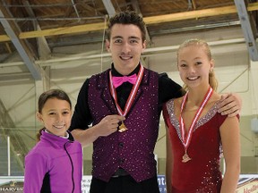 Keirghan Rockefeller (left), Nathan O'Brien and Madeline Jelsma represented the Tillsonburg Skating Club at the Western Ontario Sectional Championships in Sarnia, Nov. 7-9. Rockefeller was second in juvenile women's U12, O'Brien first in novice pairs, and Jelsma third in pre-novice women's. (CHRIS ABBOTT/TILLSONBURG NEWS)