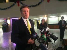 Mayor-elect John Tory speaks to reporters at Toronto City Hall on Tuesday, Nov. 25, 2014. (DON PEAT/Toronto Sun)