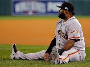 Pablo Sandoval of the San Francisco Giants stretches before Game 6 of the 2014 World Series at Kauffman Stadium on October 28, 2014. (Doug Pensinger/Getty Images/AFP)