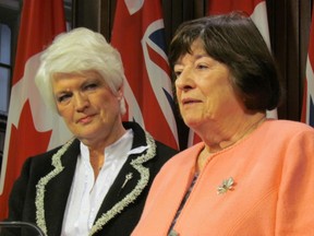 Ontario Education Minister Liz Sandals (left) announces that she has asked Margaret Wilson, right, to review the Toronto District School Board over growing governance concerns Tuesday, November 25, 2014. (Antonella Artuso/Toronto Sun)