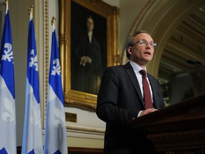 Quebec's treasury board president, Martin Coiteux, made an announcement at a press conference in Quebec City on Tuesday, November 25, 2014. SIMON CLARK / JOURNAL DE QUEBEC / QMI AGENCY