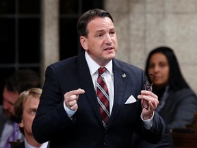 Canada's Natural Resources Minister Greg Rickford speaks during Question Period in the House of Commons on Parliament Hill in Ottawa November 19, 2014. REUTERS/Chris Wattie