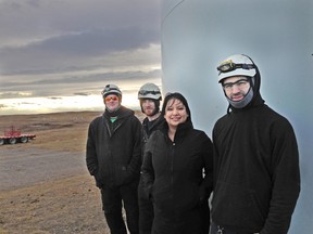 A week of refurbishments and $400,000 later the monster wind turbine Weather Dancer was finally spinning again as of Friday, Nov. 21 after four years of inactivity. Left to right: Gary Sindt and Tory Rheingans of Vestas from Iowa, Katrina Shade, manager of PRD and Mike Cyr of Vestas in Pincher Creek. John Stoesser photo/QMI Agency