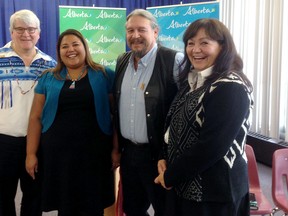 New Alberta government program, Alberta men stand together against violence toward Aboriginal women. R-L:  Associate Minister of Aboriginal Relations David Dorward, Koren Lightening Earle, Merle White President of the Association of Friendship Centres Association, and Grace Auger. Earle and Auger both sit on the First Nation Women's Economic Security Council. The campaign asks men and boys to wear moose hide swatches to show their support for the elimination of violence against Aboriginal women and to honour the women and girls in their lives. Aboriginal women are three times more likely than other women to experience violence by a spouse, acquaintance or stranger. Photo Supplied/ Government of Alberta