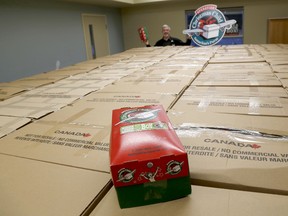 Emily Mountney-Lessard/The Intelligencer
Sylvain Champagne stands among some of the 5,730 boxes heading to children as part of Operation Christmas Child. He said the program reached an all-time high for donations this year.
