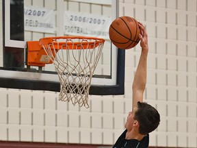 Josh Turner of the Assumption Lions senior boys basketball team goes to the hoop during a practice on Thursday, November 20, 2014 at Assumption College in Brantford, Ontario.Brian Thompson/Brantford Expositor/QMI Agency