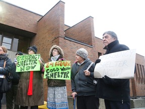 Gino Donato/The Sudbury Star
In this file photo, SCAP members and supporters hold a rally outside 200 Larch Street to push for a faster opening of the Out of the Cold shelter at that location.