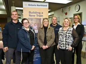 Marty Bizier, Rebecca McGlynn, Sharon Tansley, Dennis Higgs, Tracey MacPhee, and Corina Moore pose during Tuesday night's Polar Express' 50th Anniversary celebrations. Along with the anniversary celebrations Ontario Northland also announced the refurbishment of the train.