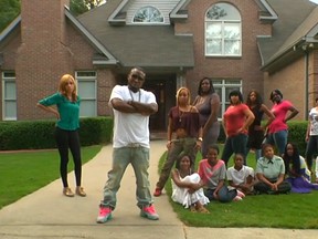 Rapper Shawty Lo with some of his baby mamas and children.