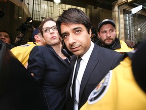 Jian Ghomeshi leaves College Park court  on Wednesday, Nov. 26, 2014. (VERONICA HENRI/Toronto Sun)