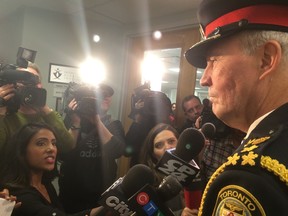 Chief Bill Blair speaks to reporters on Wednesday following the arrest of Jian Ghomeshi. (DON PEAT/Toronto Sun)