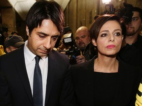 Jian Ghomeshi leaves College Park Court with lawyer Marie Henein after being freed on bail on Wednesday, November 26, 2014. (Craig Robertson/Toronto Sun)