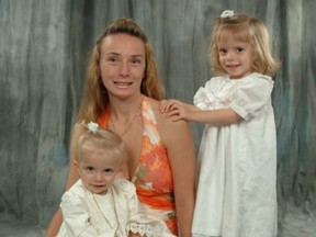 Family photograph showing Elaine Campione, mother of three-year-old Serena (R) and one-year-old Sophia, during a portrait session just weeks before the two children were killed.