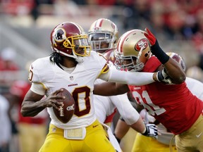 Robert Griffin III will be watching from the sideline when the ’Skins face the Colts this week. (AFP)