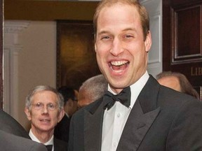 Prince William laughs as he was introduced to present the Chatham House Prize 2014, at the Banqueting House in London November 21, 2014.   REUTERS/Arthur Edwards/Pool