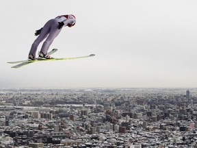 Poland's Kamil Stoch soars through the air during a trial round in the FIS World Cup Ski Jumping in Sapporo, northern Japan January 29, 2012. (REUTERS/Kim Kyung-Hoon)