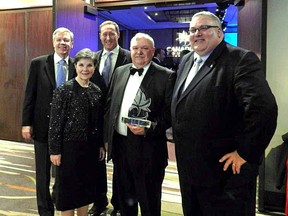 Ian Raven is happy to share the Canadian Tourism Awards’ Brewster Travel Innovator of the Year Award with some of the people who played important roles in Project Ojibwa’s history. From left to right, Jim Hudson, SWOTC; Catherine Raven, webmaster; MP Peter McKay, Minister of Justice and Attorney General; Ian Raven, executive director; and MP Joe Preston. McKay, then Minister of National Defence, was responsible for donating HMCS Ojibwa to the Elgin Military Museum. (CONTRIBUTED PHOTO)