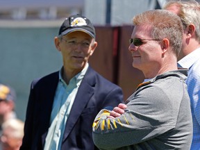 Ticats owner Bob Young (left) and Director of Pro Personnel and U.S. Scouting Eric Tillman. (MICHAEL PEAKE/QMI AGENCY)