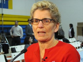 Ontario Premier Kathleen Wynne announces a partnership with Active At School during an event in Toronto on November, 27 2014, to ensure kids get at least 60 minutes of physical activity a day. (Antonella Artuso/Toronto Sun)