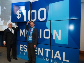 (left to right) NAIT President and CEO Dr. Glenn Feltham and Brent Hesje, chair of the NAIT Board of Governors and CEO of Fountain Tire, take part in NAIT's launch of its $100 million fundraising initiative, Essential: The NAIT Campaign, at the NAIT main campus in Edmonton Alta., on Thursday Nov. 27, 2014. David Bloom/Edmonton Sun