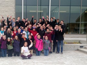 A group of about 50 students from St. Theresa Catholic Secondary School in Belleville, Ont, including three adults and made up of both male and female students, wearing pink bracelets that read “Bring Mrs. Shortland back” show their support for biology teacher Leah Shortland outside Quinte Courthouse in Belleville, Ont. Thursday morning, Nov. 27, 2014. Shortland, 40, was charged in October, following an investigation by Belleville police’s criminal investigations branch. - SUBMITTED PHOTO