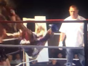 Kickboxer Jonathan Tuhu delivers a crushing roundhouse kick to his opponent's head. (YouTube screen grab)