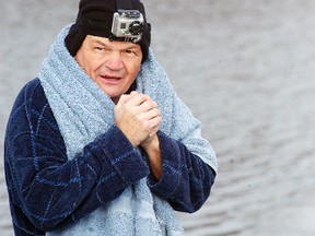 Wallaceburg United Way campaign chair Newt Richardson tries to keep warm before he goes into the water on Nov. 28, during the United Way's third annual Freezin' for a Reason polar bear dip held at MacDonald Park. The event was a fundraiser for the local United Way campaign.