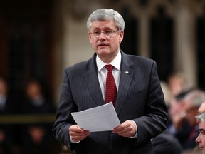 Prime Minister Stephen Harper speaks during Question Period in the House of Commons on Parliament Hill in Ottawa November 25, 2014. REUTERS/Chris Wattie