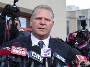 Doug Ford holds press conference announcing he will not be running for the leadership of the Ontario PC party in Toronto, Ont. on Thursday November 27, 2014. (Craig Robertson, QMI Agency)
