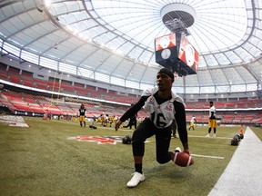 Hamilton Tiger-Cats Brandon Banks bowls with a football during their team's practice at the CFL's 102nd Grey Cup week in Vancouver on November 28, 2014. (REUTERS/Todd Korol)